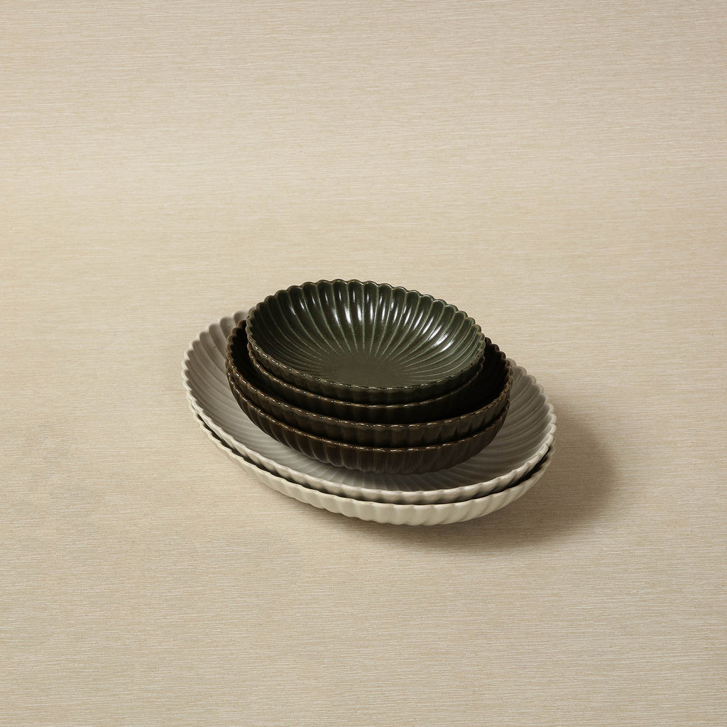 Scalloped oval graphite bowl