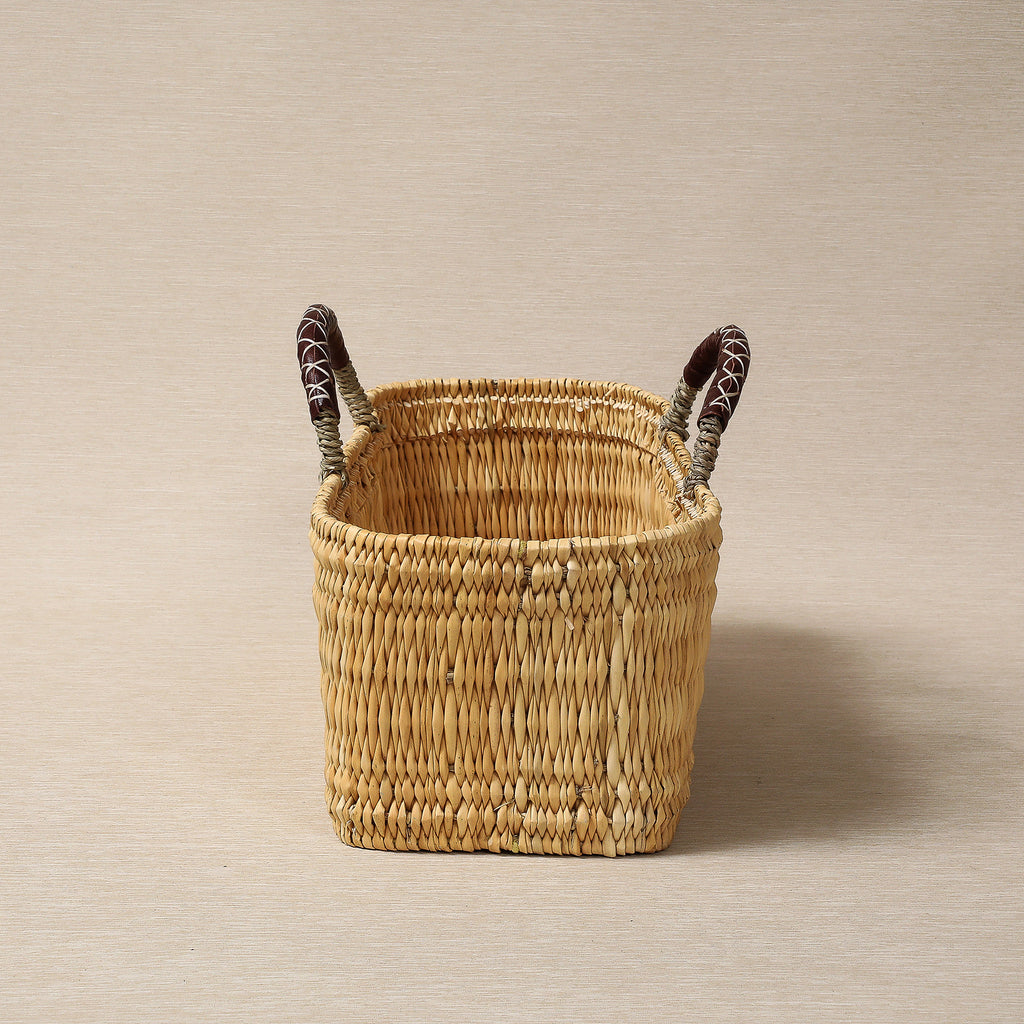 Large oblong low basket with leather handles