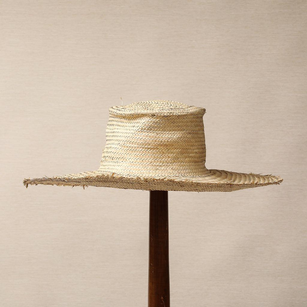 Woven palm leaf sun hat