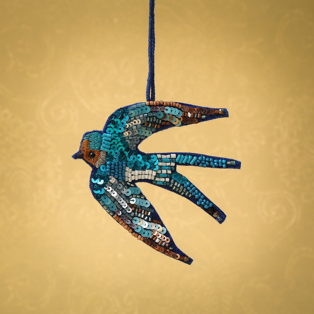 Stitched and sequin swallow ornament