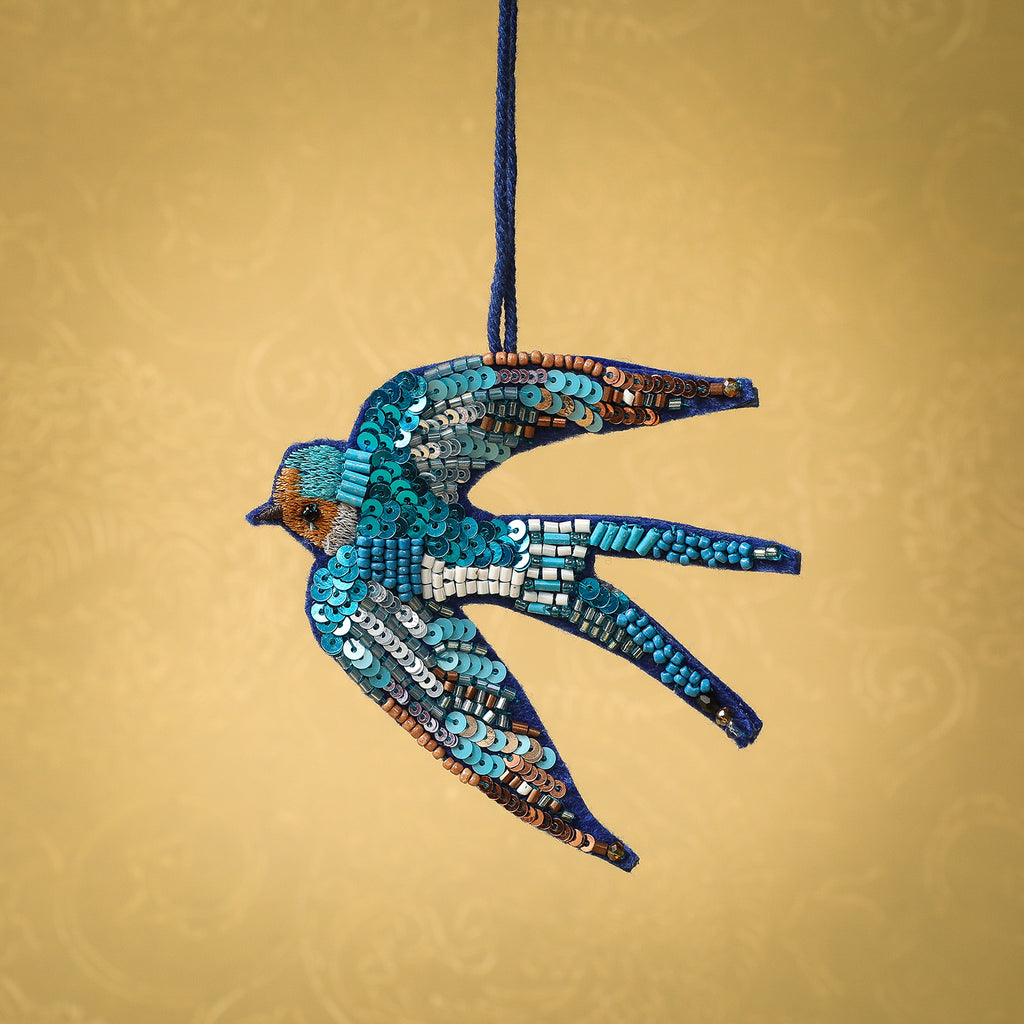 Stitched and sequin swallow ornament