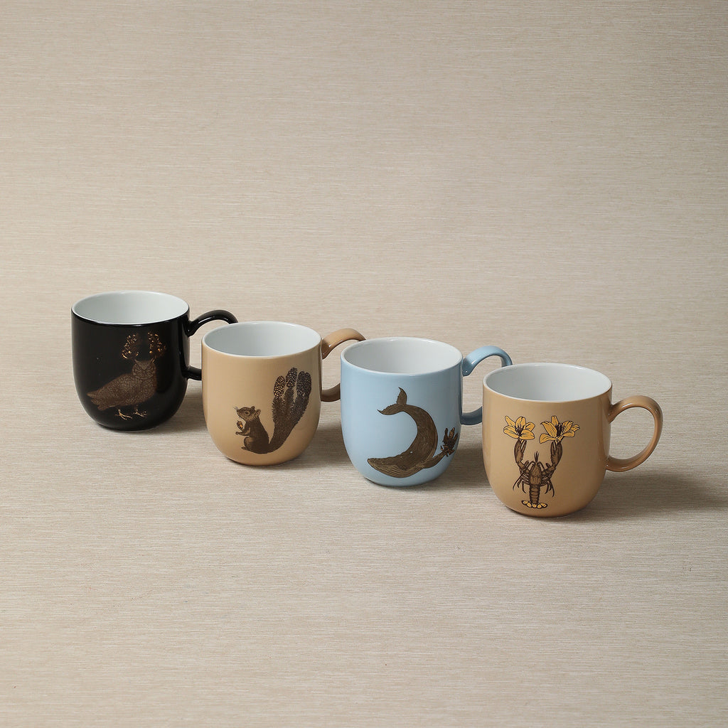 Gold animal motif mug