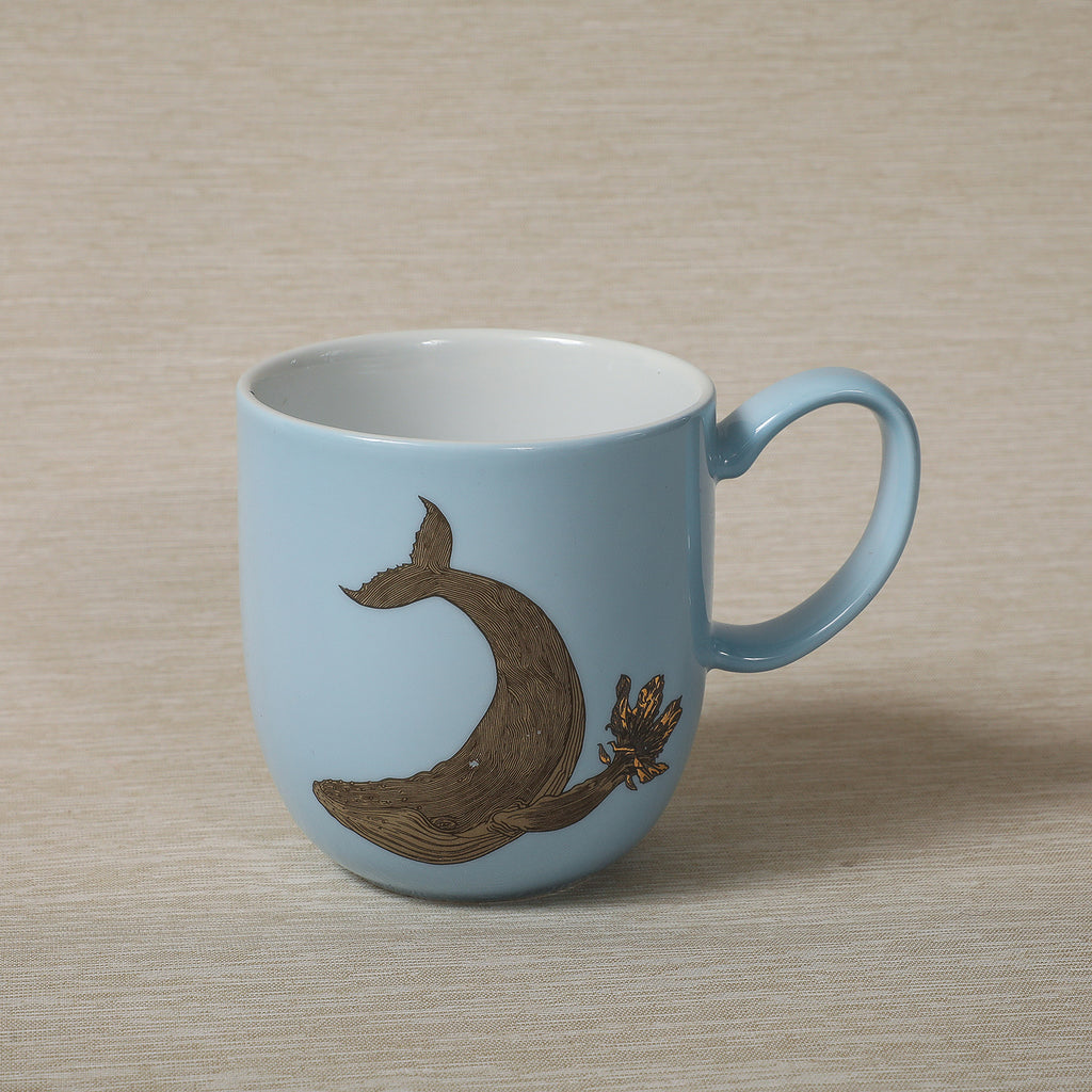 Gold animal motif mug