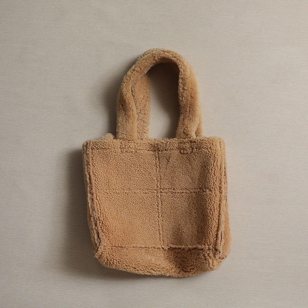 Reversible shearling tote