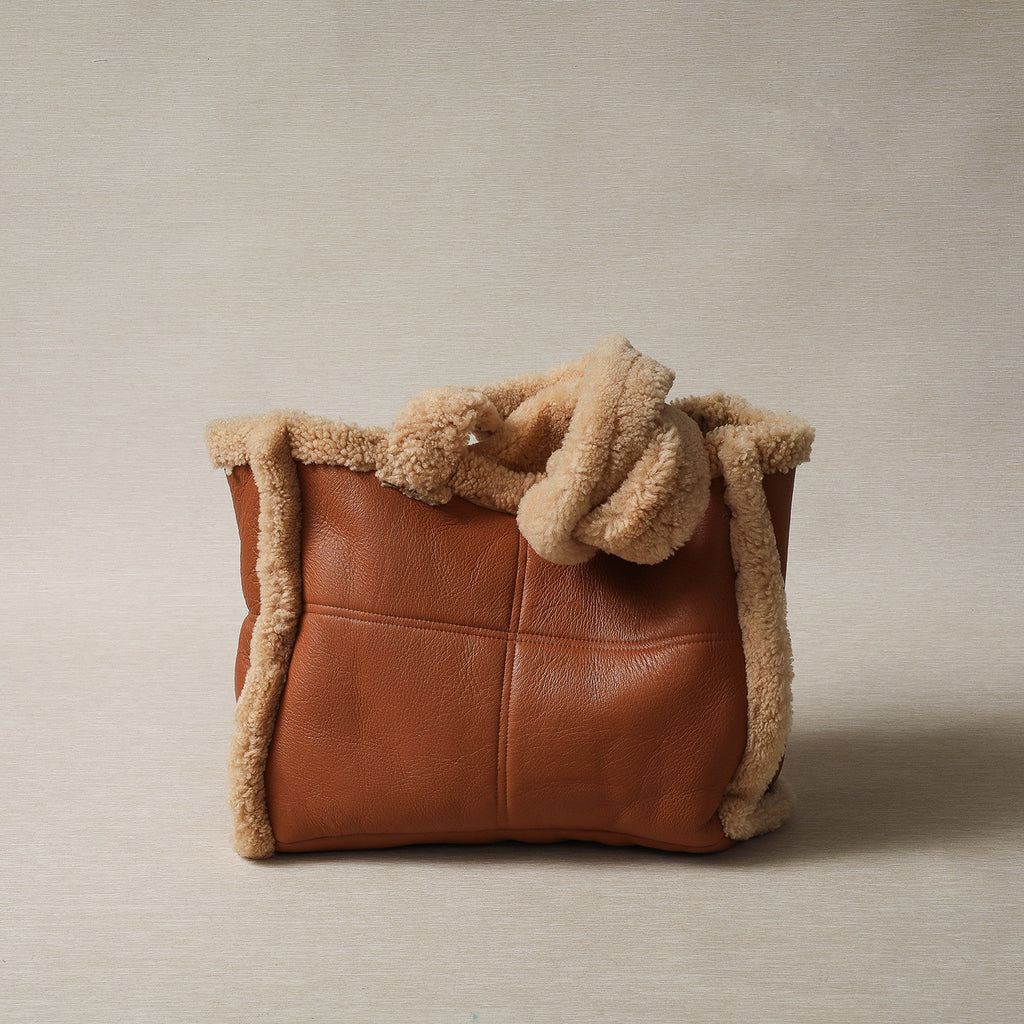 Reversible shearling tote