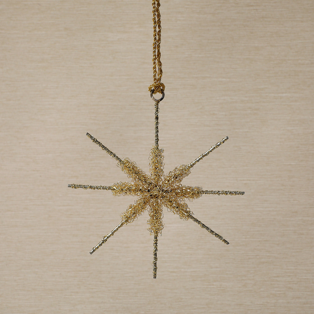 Assorted gold tinsel star ornament