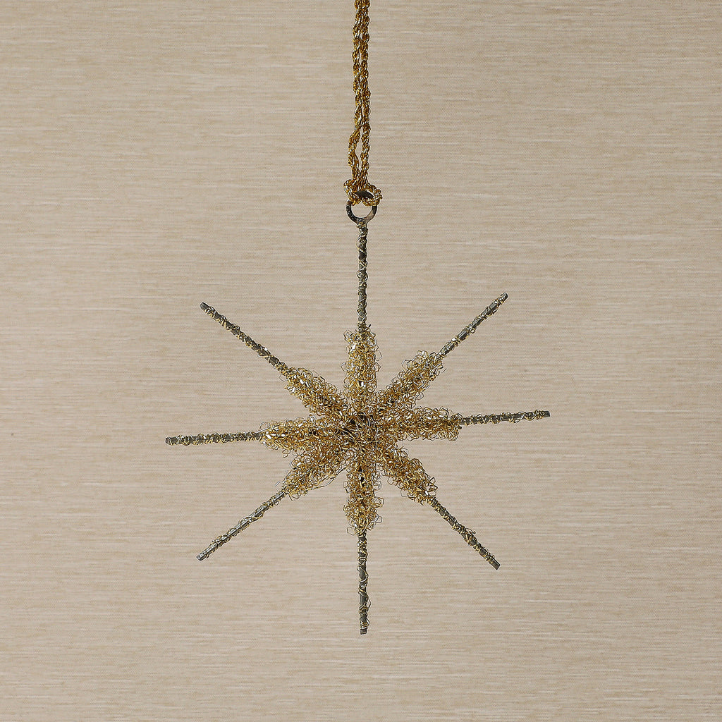 Assorted gold tinsel star ornament