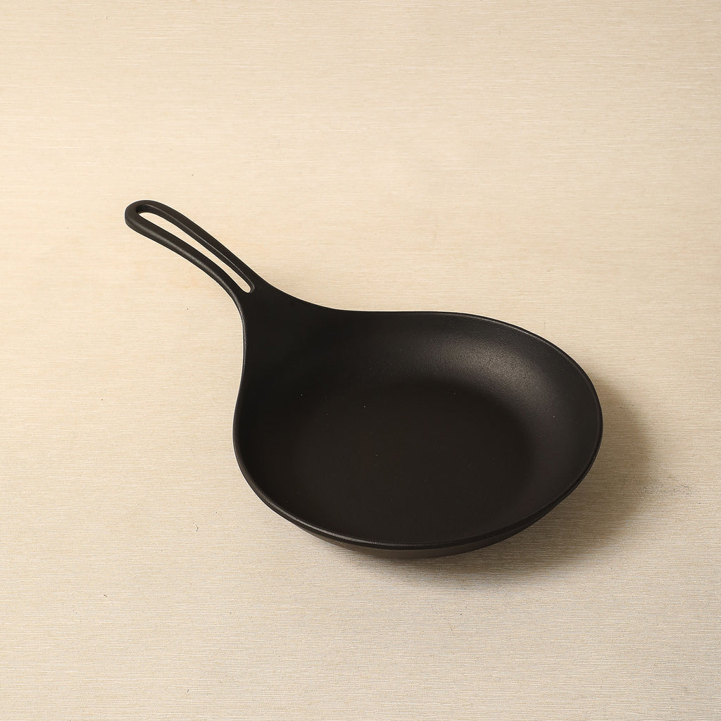 Cast iron omelette pan