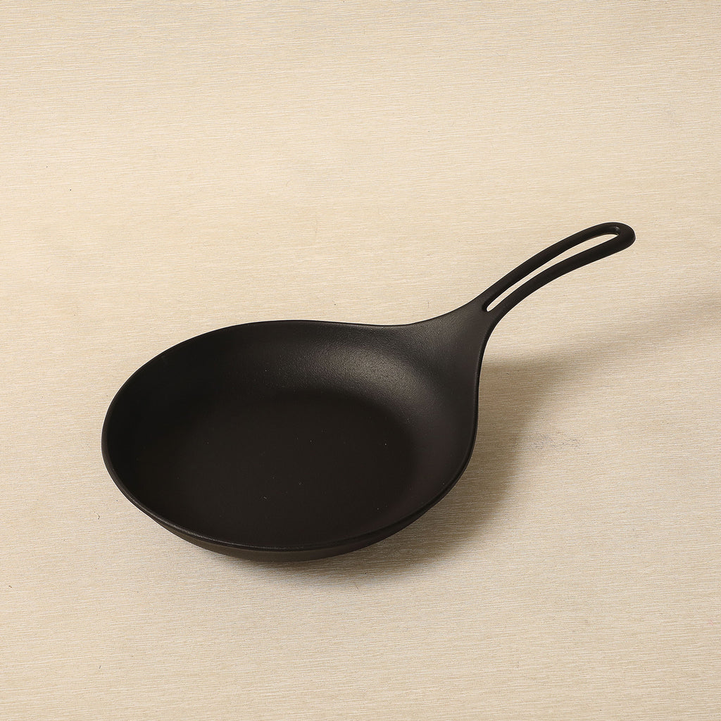 Cast iron omelette pan
