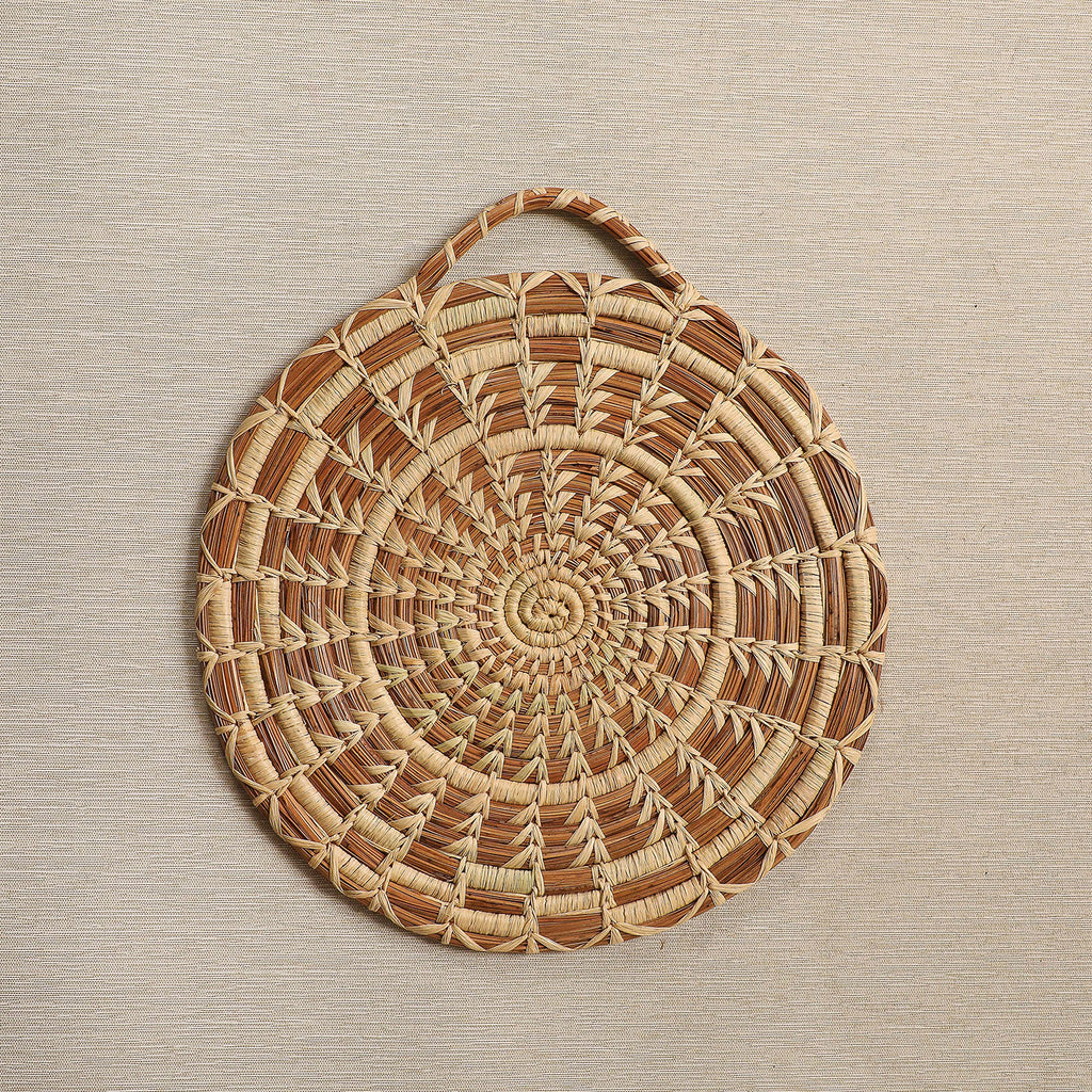 Hanging pine needle trivet