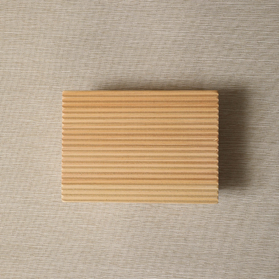 Earthsaver soap rest made from combed hinoki wood