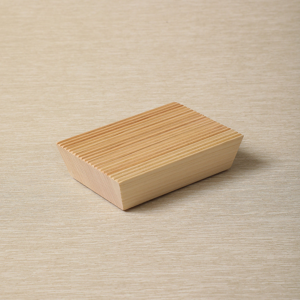 Earthsaver soap rest made from combed hinoki wood