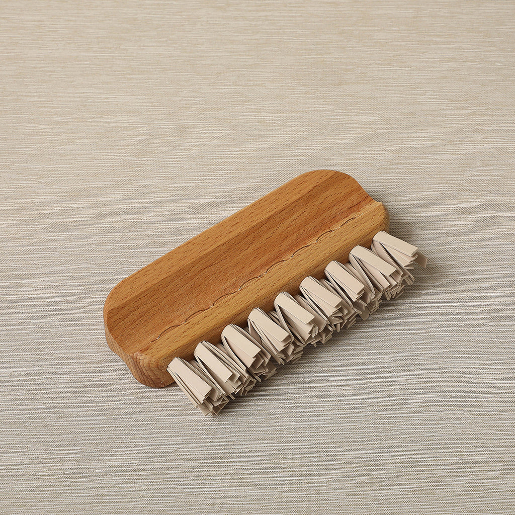 Wood handle lint brush