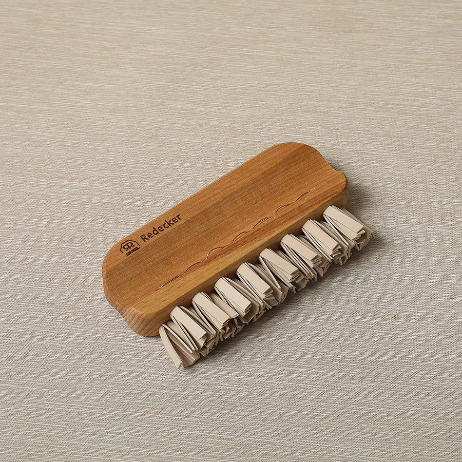 Wood handle lint brush