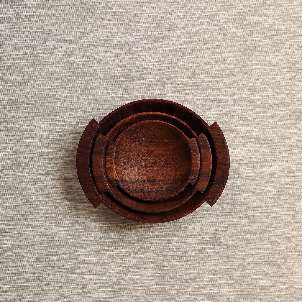 Set of three small wood bowls