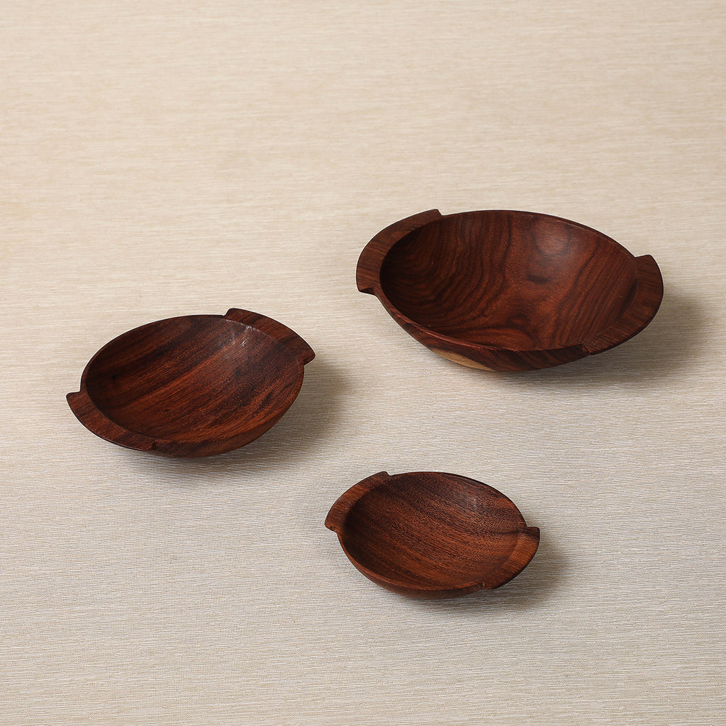 Set of three small wood bowls
