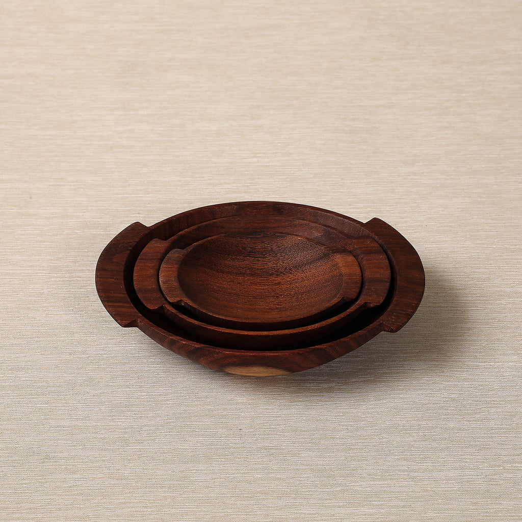 Set of three small wood bowls