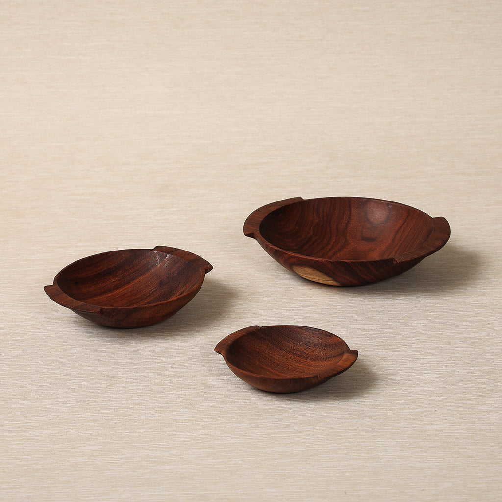 Set of three small wood bowls