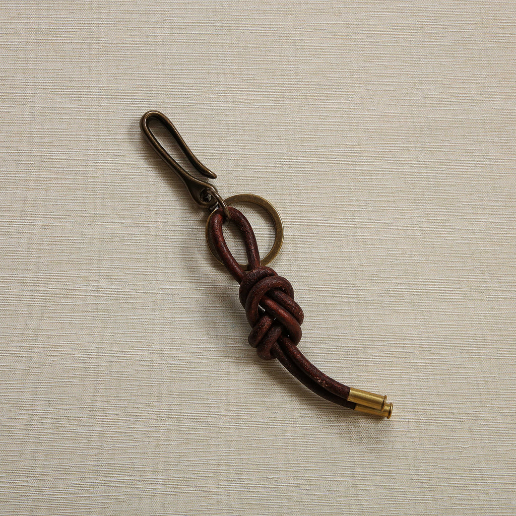 Brass hook and leather key chain