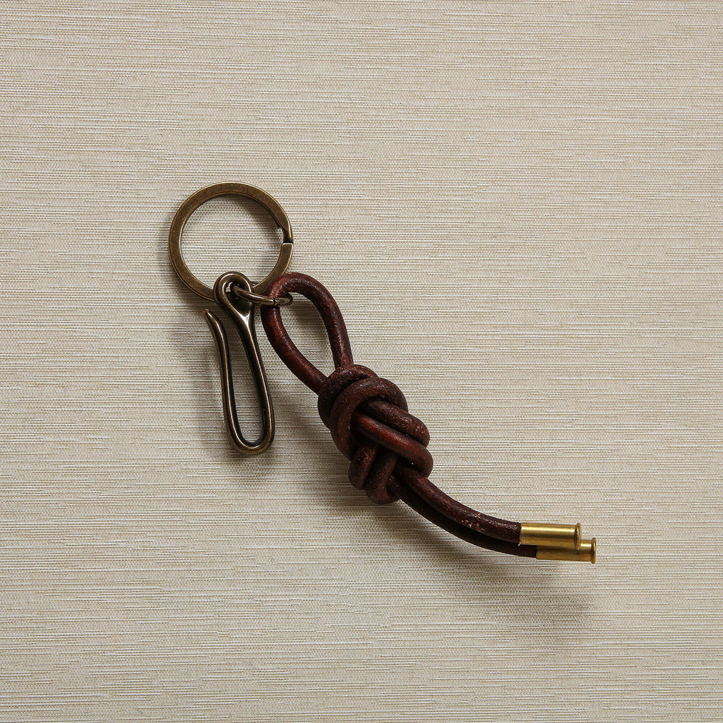 Brass hook and leather key chain