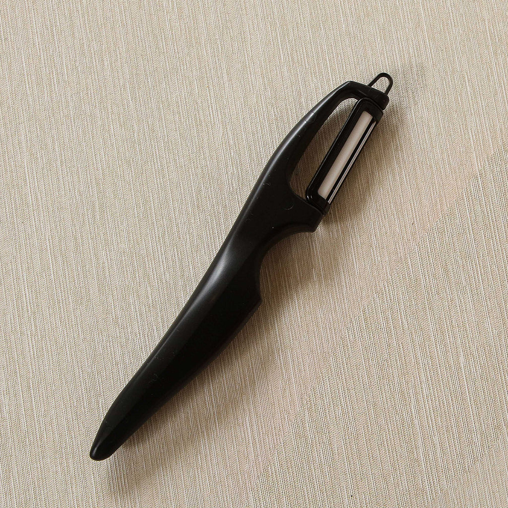 Vertical double edge ceramic peeler