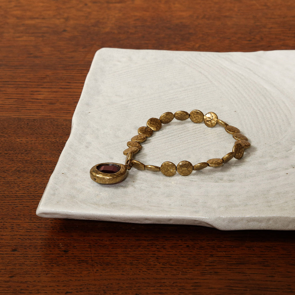 Brass hammered bead bracelet with quartz