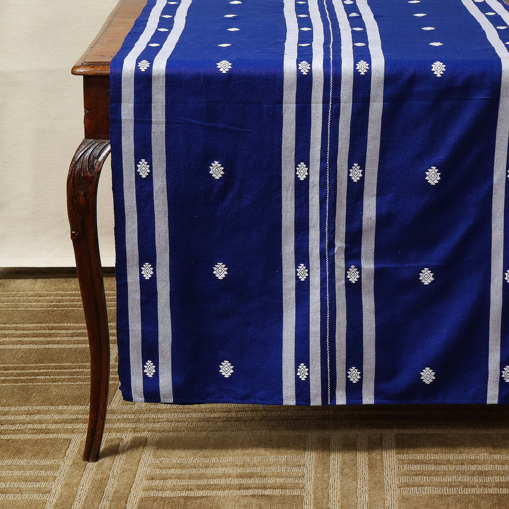 Handmade tablecloths by Maria Diaz Ruiz of handloomed cotton with embroidered star motif from Chiapas, Mexico