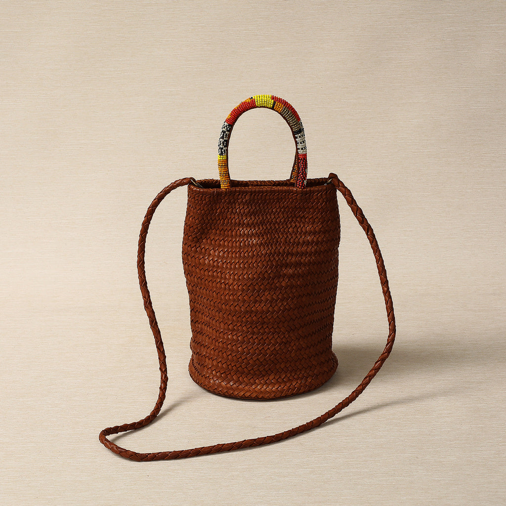 Woven Cognac lamb leather barrel bag