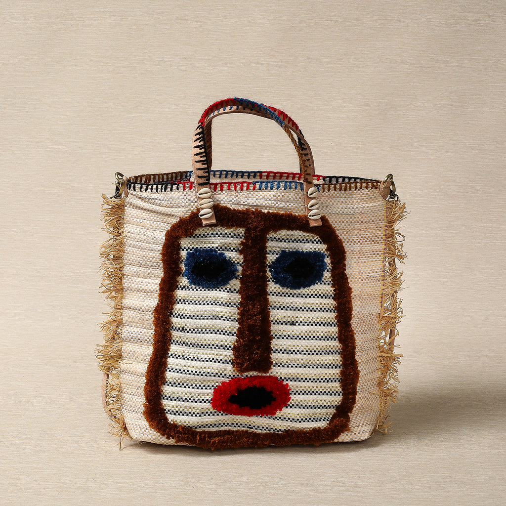 Recycled tote with face