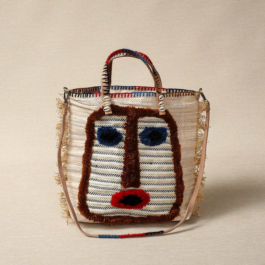 Recycled tote with face