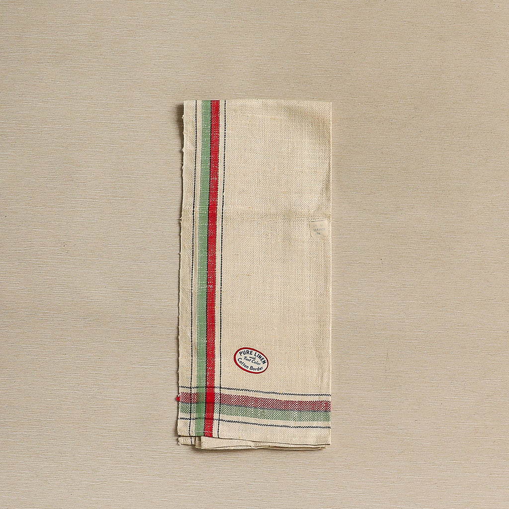 Charming vintage linen tea towel with red, green, and black borders and homespun texture c. 1940