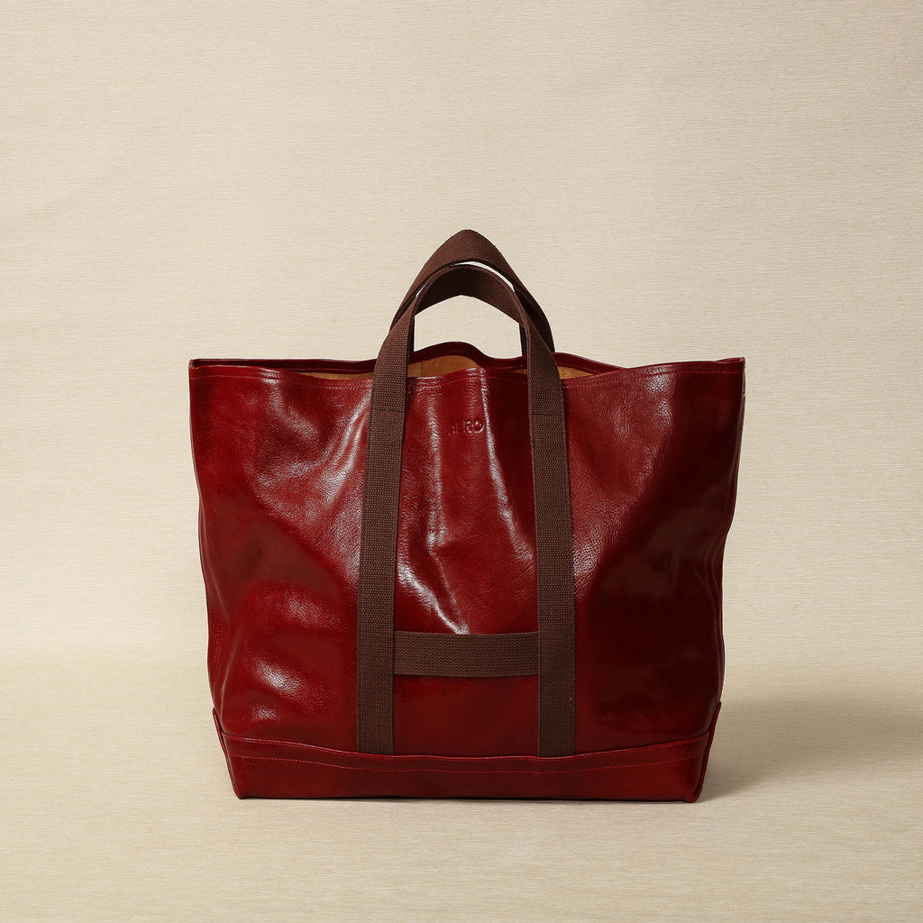 Aero leather utility bag in red with brown webbing