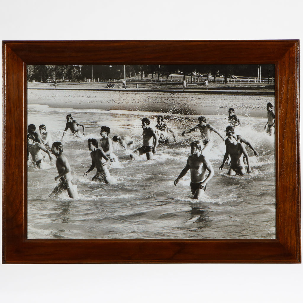 Wading military men print in a walnut frame