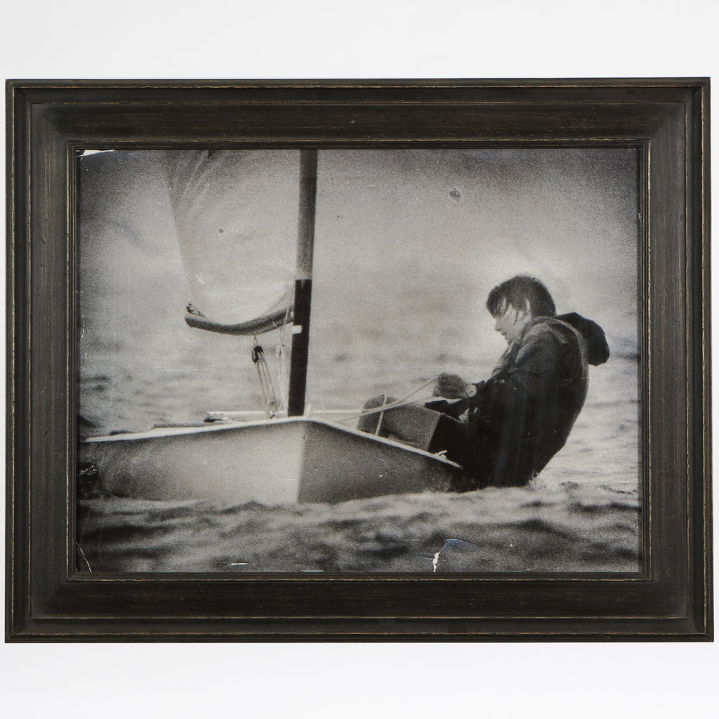 Print of a sailor balancing his sailboat