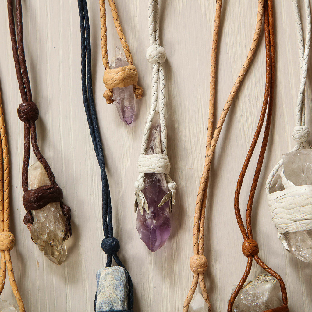 Handmade quartz & leather pendants