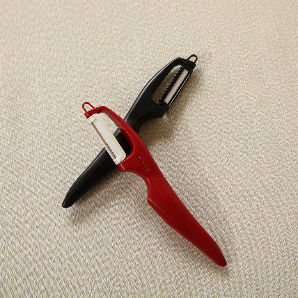 Vertical double edge ceramic peeler