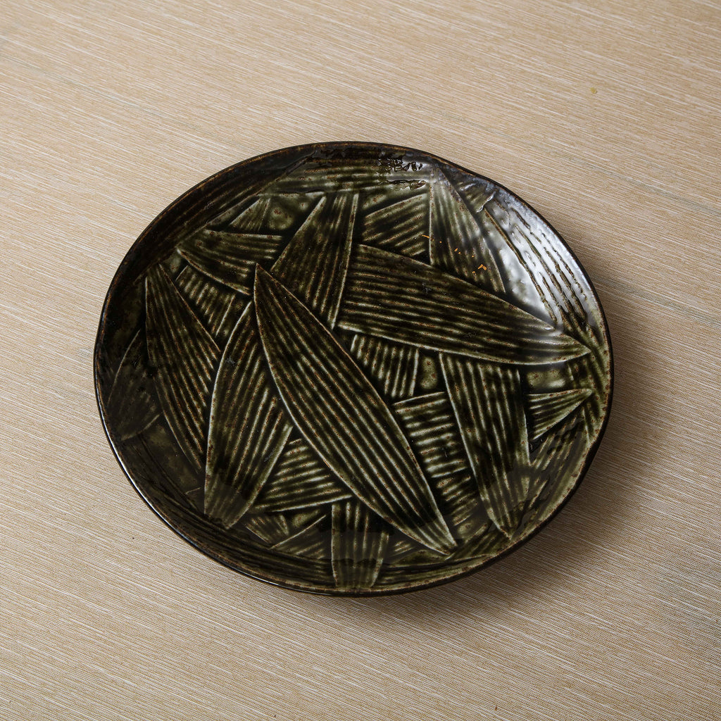 Kelp glaze dinner plate with falling leaves motif, Japan