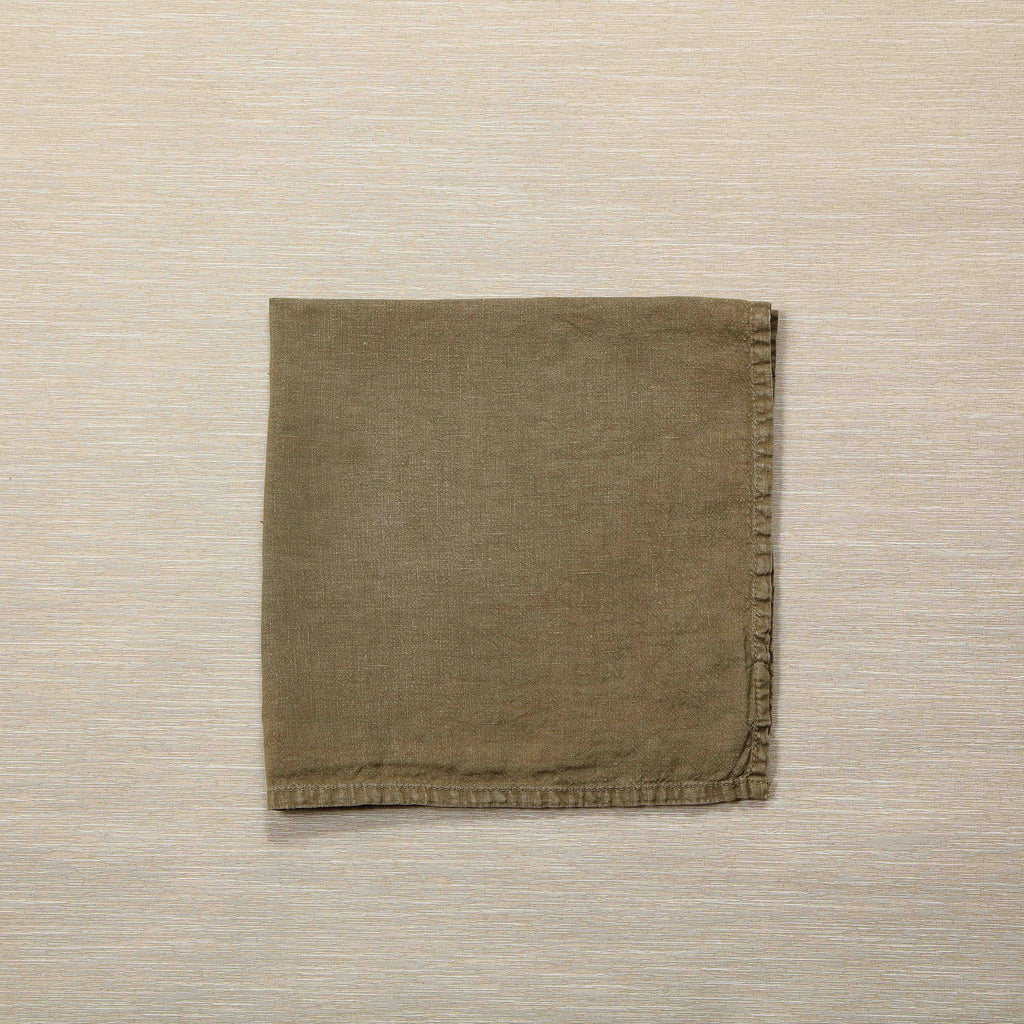 Simple linen napkin in olive