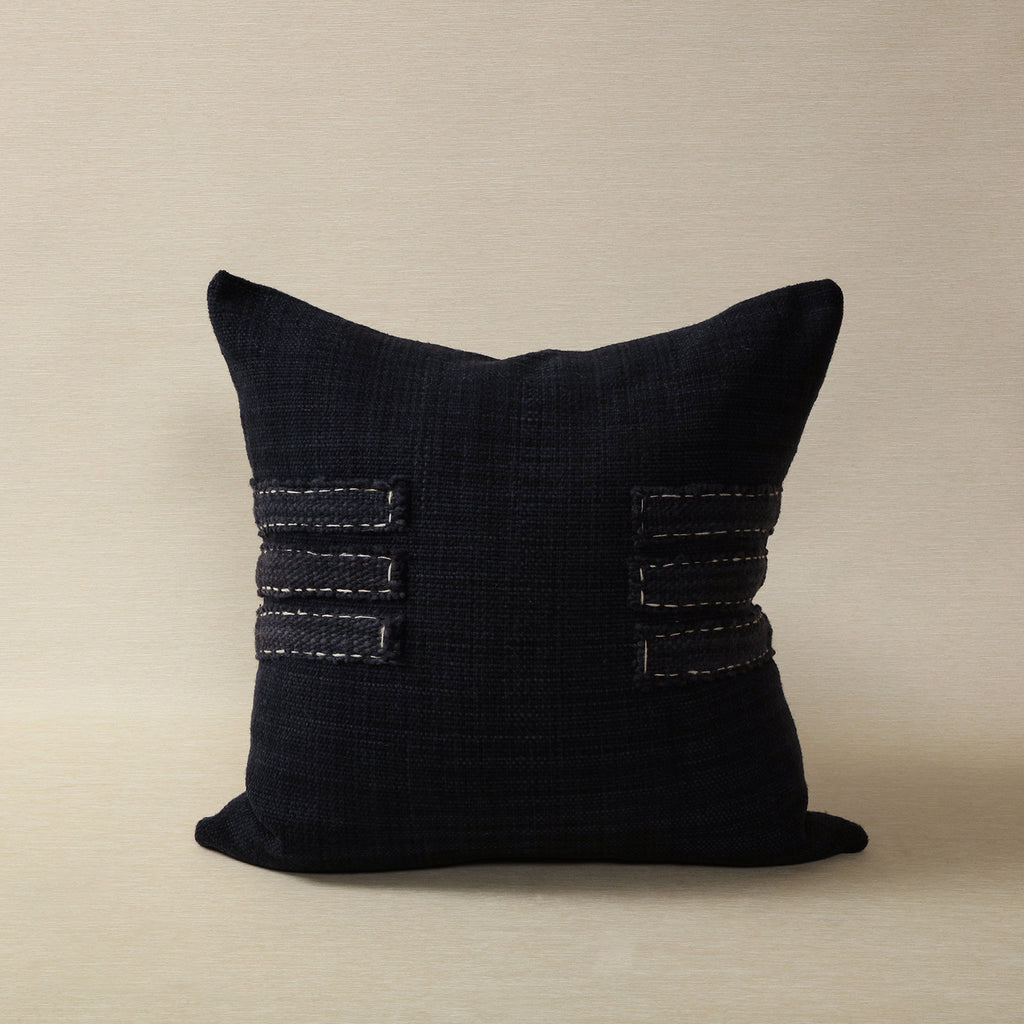 Indigo dyed hand spun wool pillow with hand stitched straps detail
